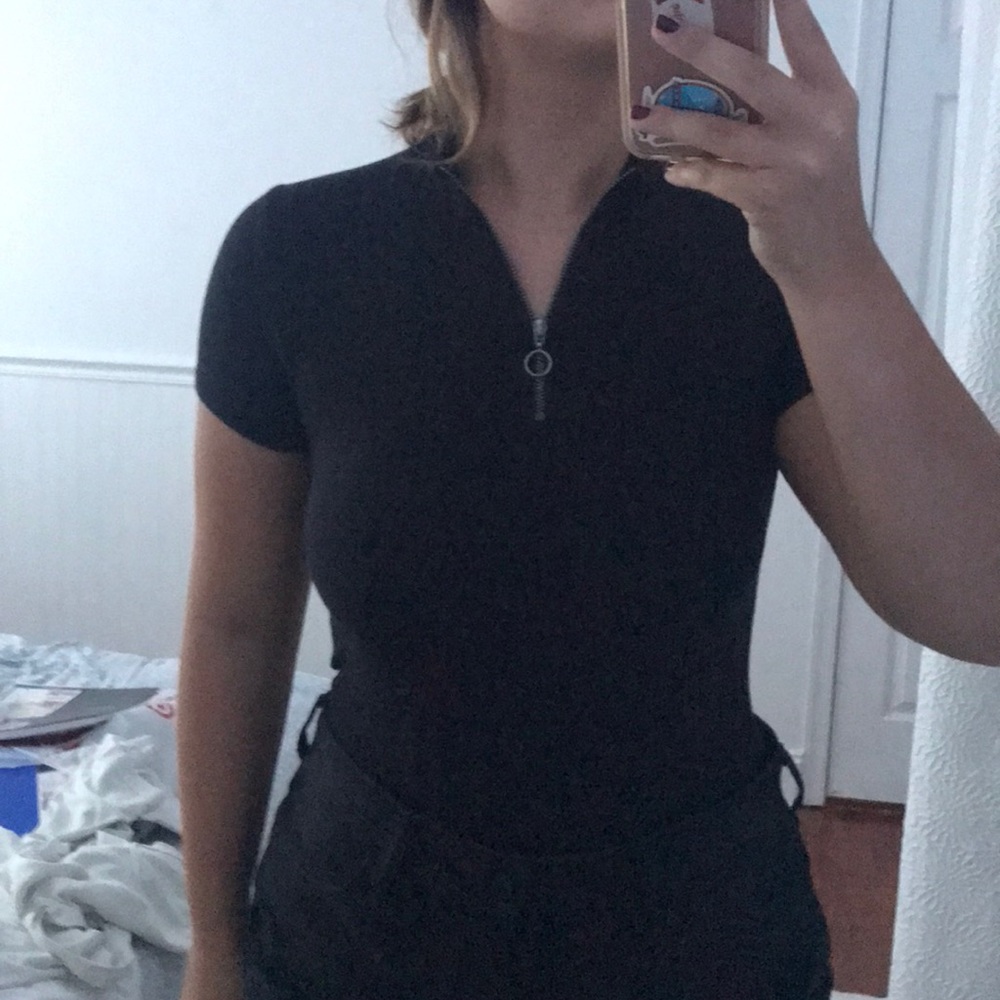 black zip up shirt